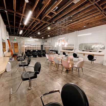 Salon interior with chairs and chandelier